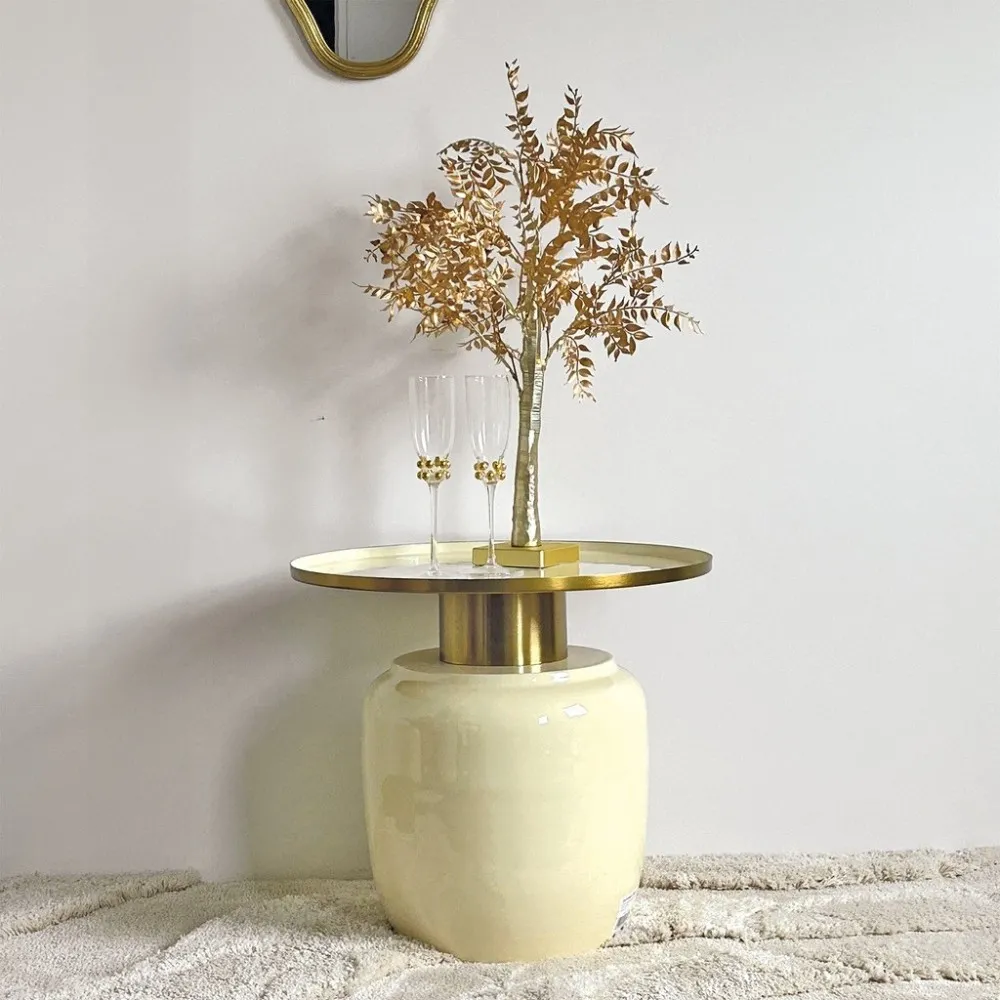 Table basse Dodu en métal laqué écru D50cm